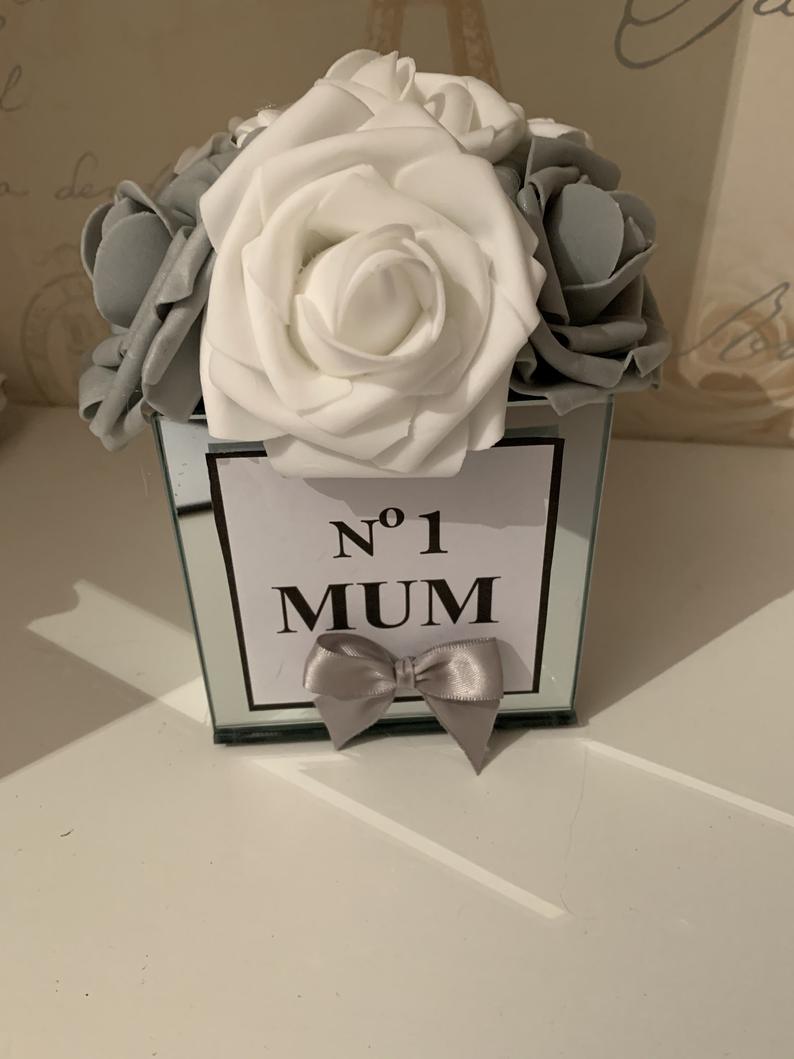 Custom made mirrored vase with roses